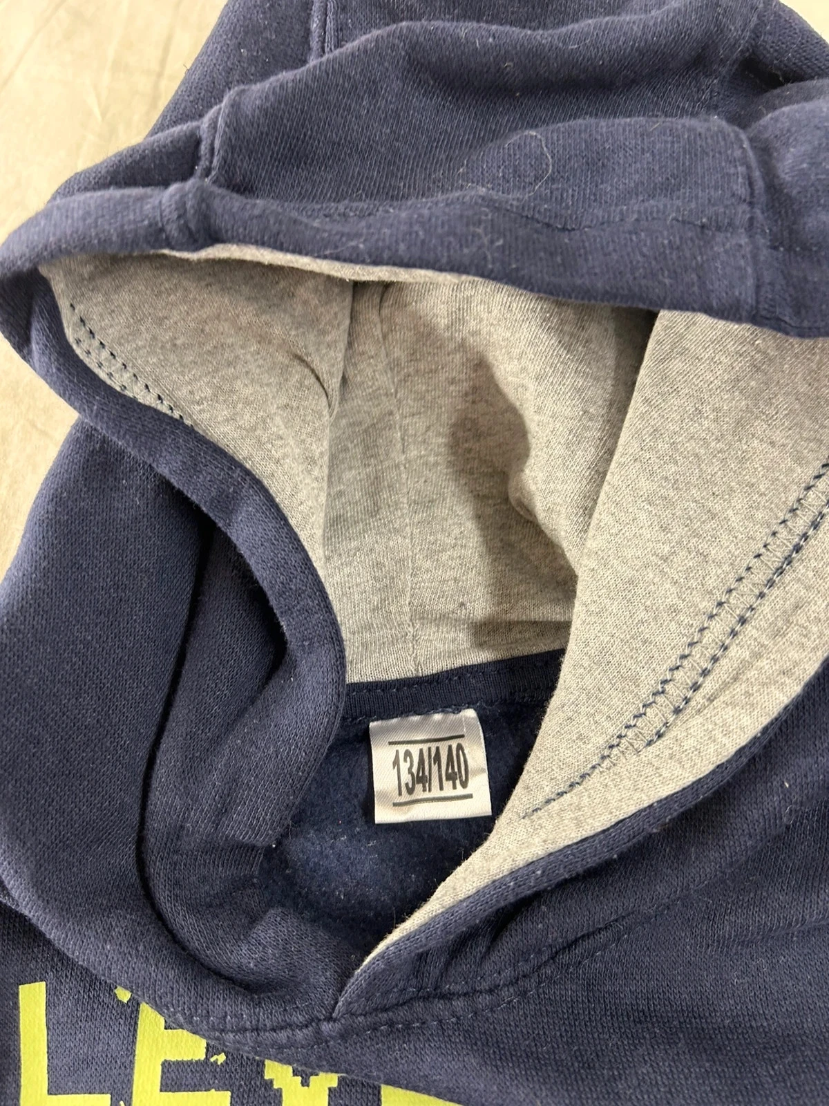 Navy blue hoodie with children's size patterns – photo 7
